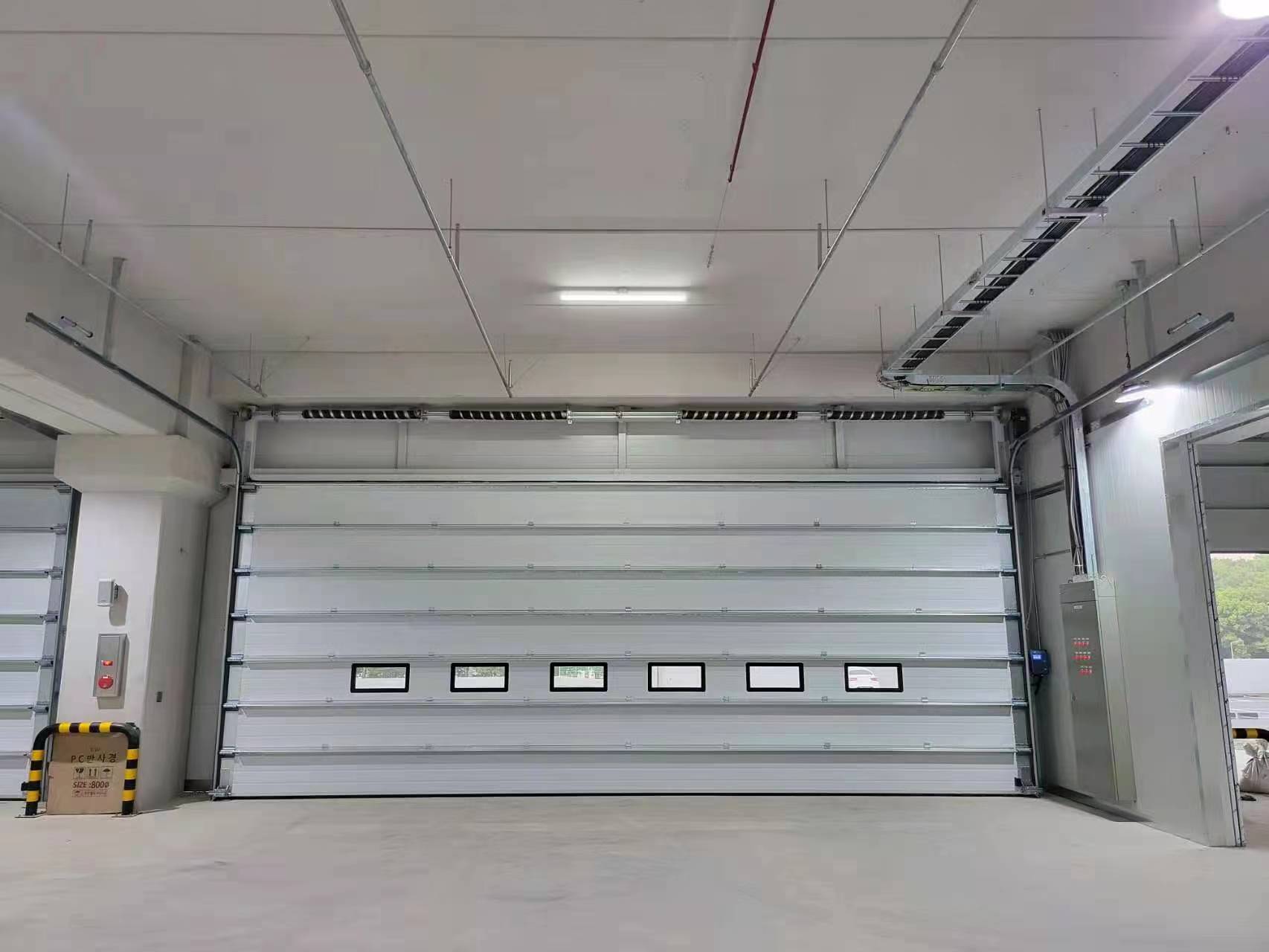 কেন একটি বিভাগীয় দরজা শুধু অ্যাক্সেস সমস্যার চেয়ে আরও বেশি সমাধান করতে পারে?